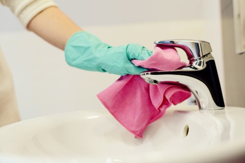 Office cleaning service tasks including desks, floors, and shared areas in SE22