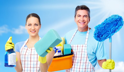 Insured carpet cleaning technician working carefully in a home